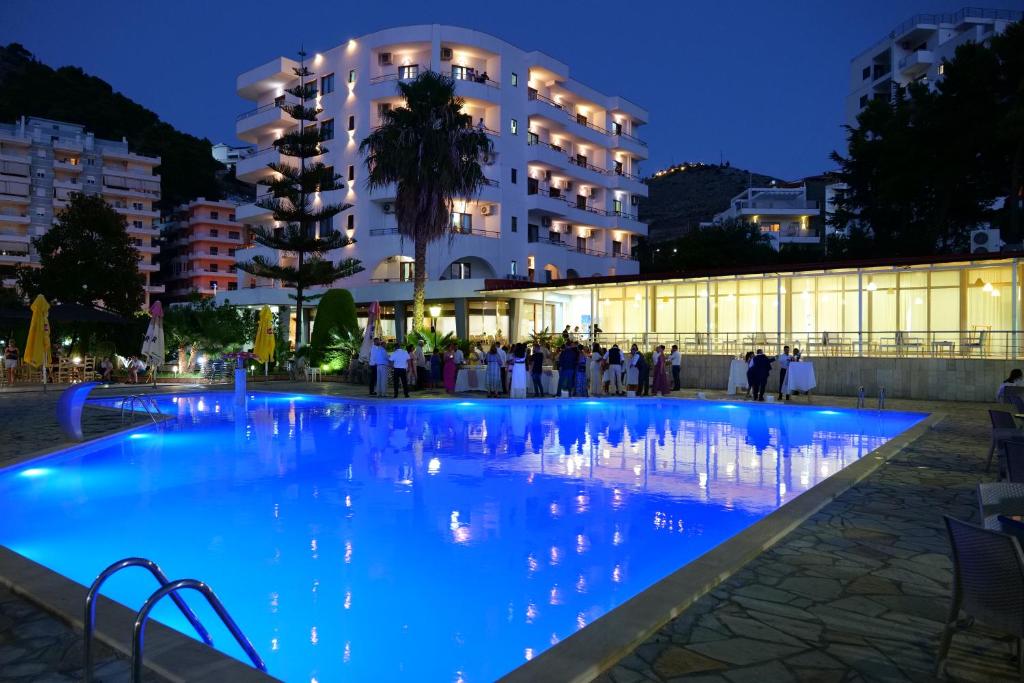 Hotel Pool and Saranda Bay Sunset